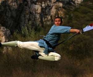 Chinese fighter wielding the blade of the green dragon