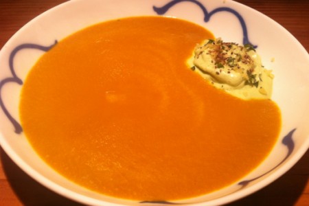 Caramelized carrot soup with coconut chutney foam