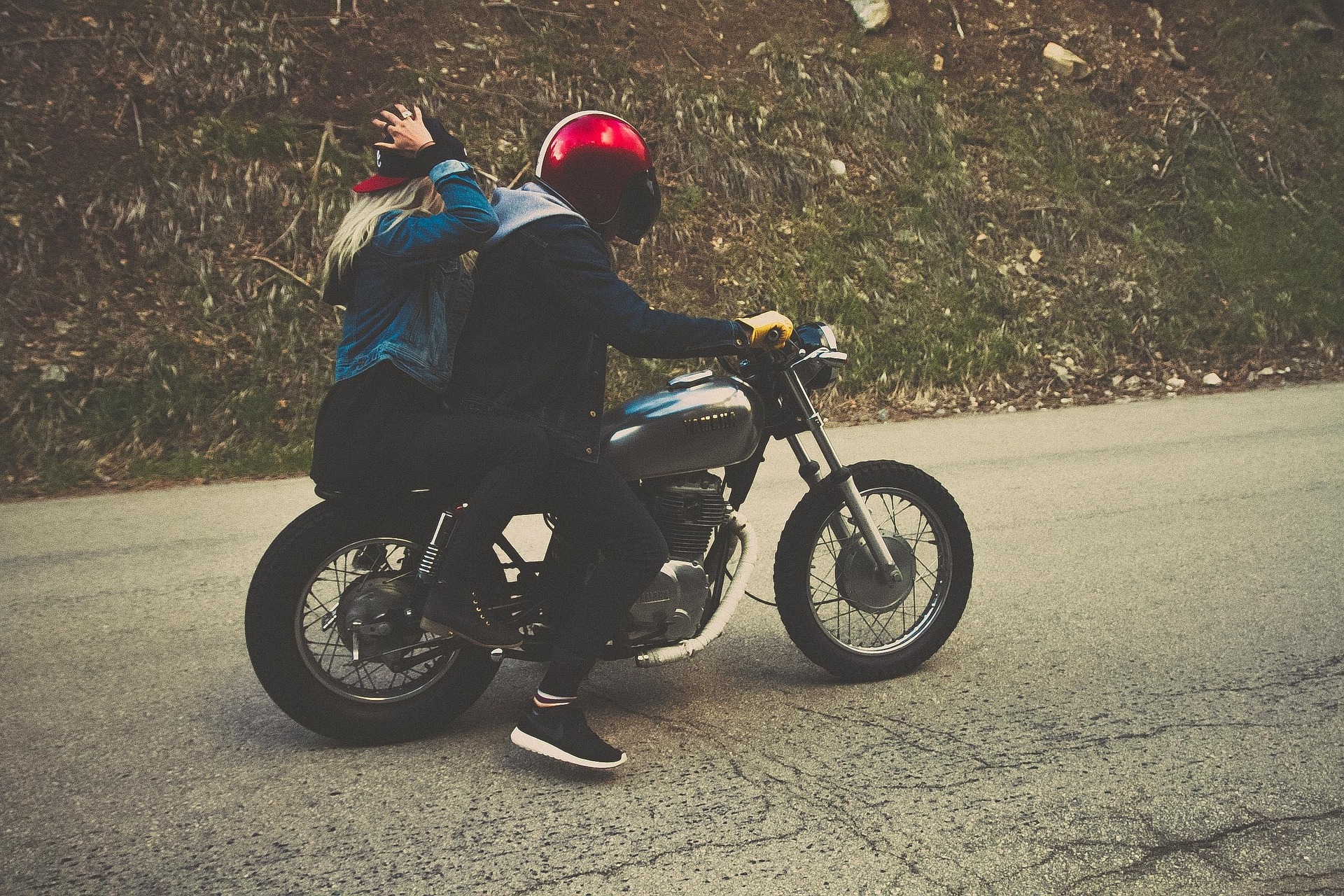 Couple riding a motorbike